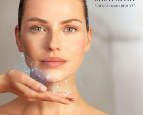 Close-up of a woman's face with a digital network overlay on her chin; SKEYNDOR logo in the top-right corner.